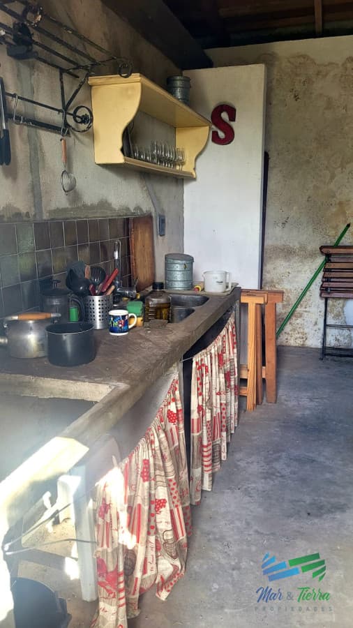 BAJO DE PRECIO !!! Muy linda casa de piedra, 9 has en las sierras y con 500 olivos