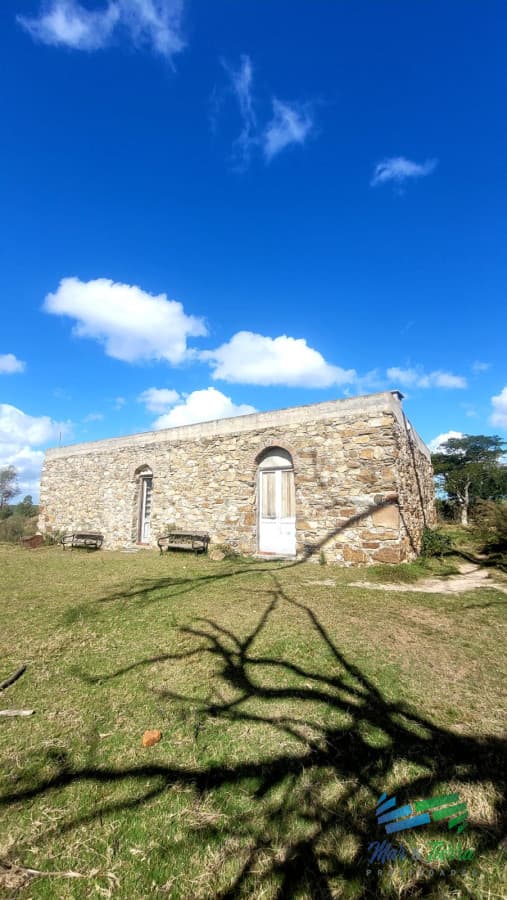 BAJO DE PRECIO !!! Muy linda casa de piedra, 9 has en las sierras y con 500 olivos
