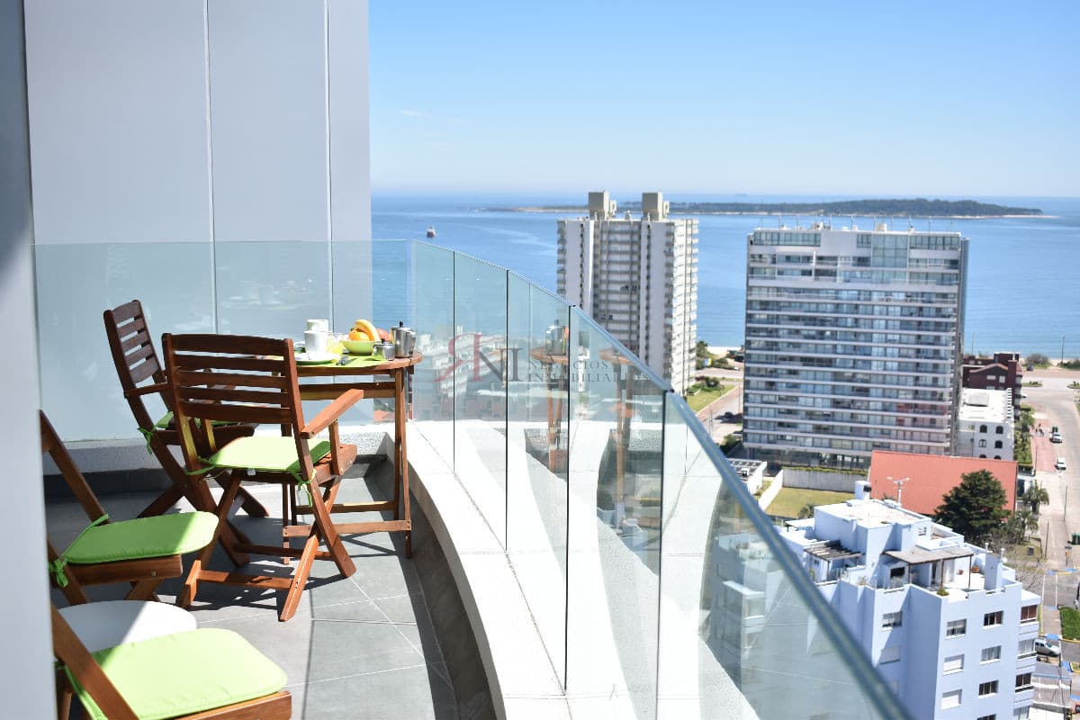 Terraza, vista a la Playa Mansa, garaje, aire acondicionado 									(ref.#11389)