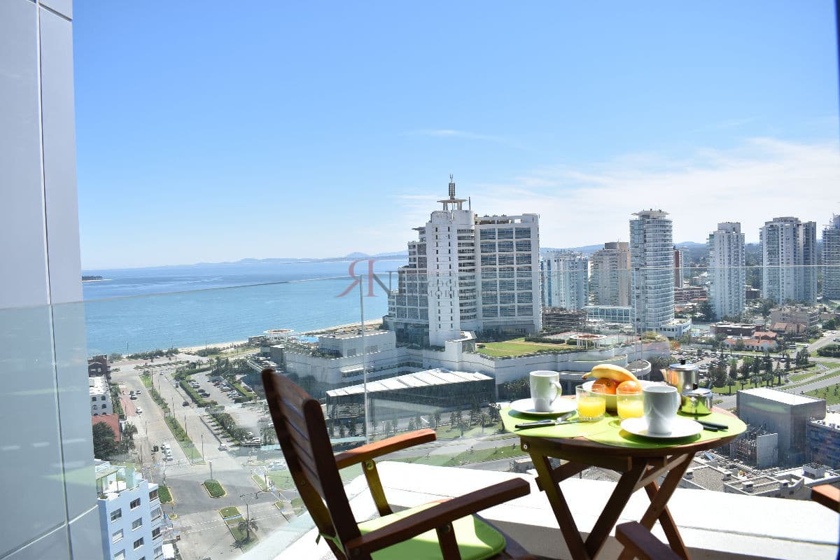 Terraza, vista a la Playa Mansa, garaje, aire acondicionado 									(ref.#11389)