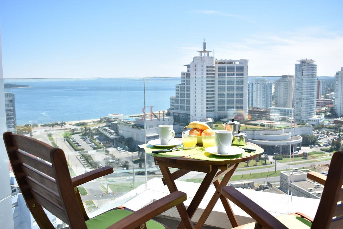 Terraza, vista a la Playa Mansa, garaje, aire acondicionado 									(ref.#11389)