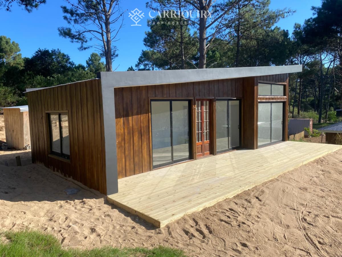 HERMOSA CASA A ESTRENAR EN UN ENTORNO UNICO DE NATURALEZA FRENTE AL ARROYO EL POTRERO  -