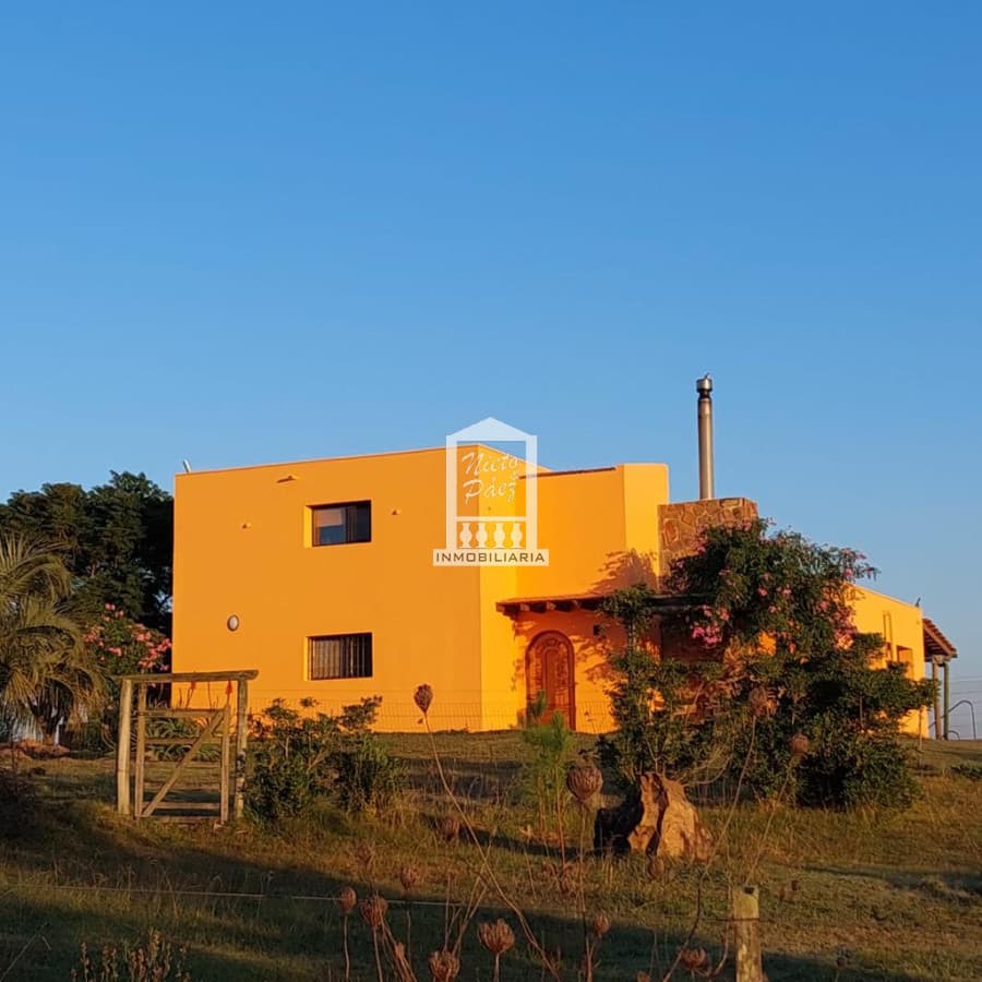 Preciosa y exclusiva chacra de 5 has en venta en Laguna del Sauce con 750 olivos plantados y casa divina con 3 dormitorios mas casa de invitados .