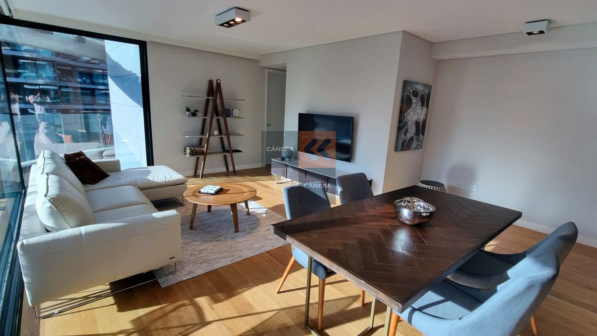 Venta con renta apartamento amueblado de 2 dormitorios en Puerto del Buceo