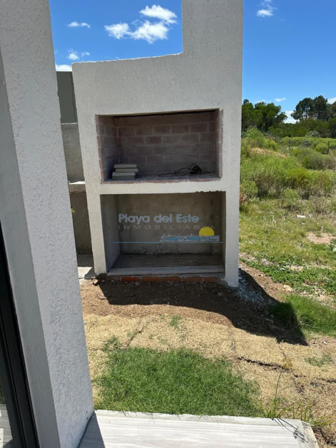 Casa PH en Venta de 2 dormitorios en Punta Negra , Piriápolis , A metros del mar  - Inmobiliaria Playa del Este