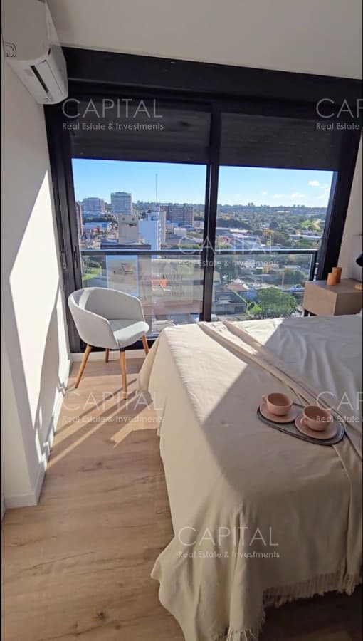 Apartamento de dos dormitorios en venta, Nostrum Malvin, sobre Av Italia.