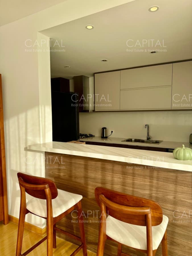 Apartamento de dos dormitorios con rooftop y parrillero propio en Complejo Alive Residences, Barrio Parques 2.