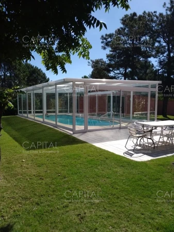 Casa en de cinco dormitorios con piscina climatizada en Tio Tom, Punta Ballena