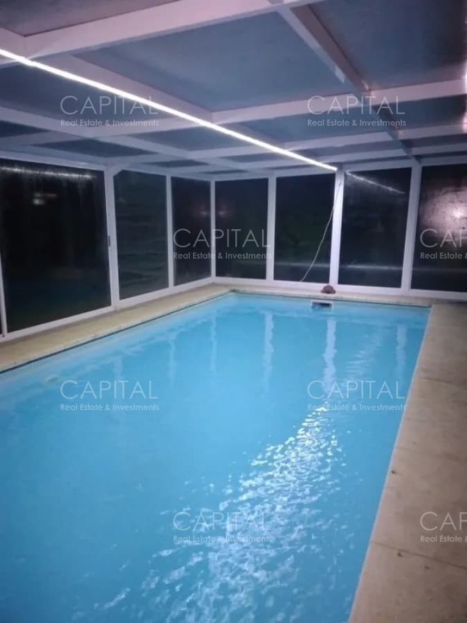 Casa en de cinco dormitorios con piscina climatizada en Tio Tom, Punta Ballena
