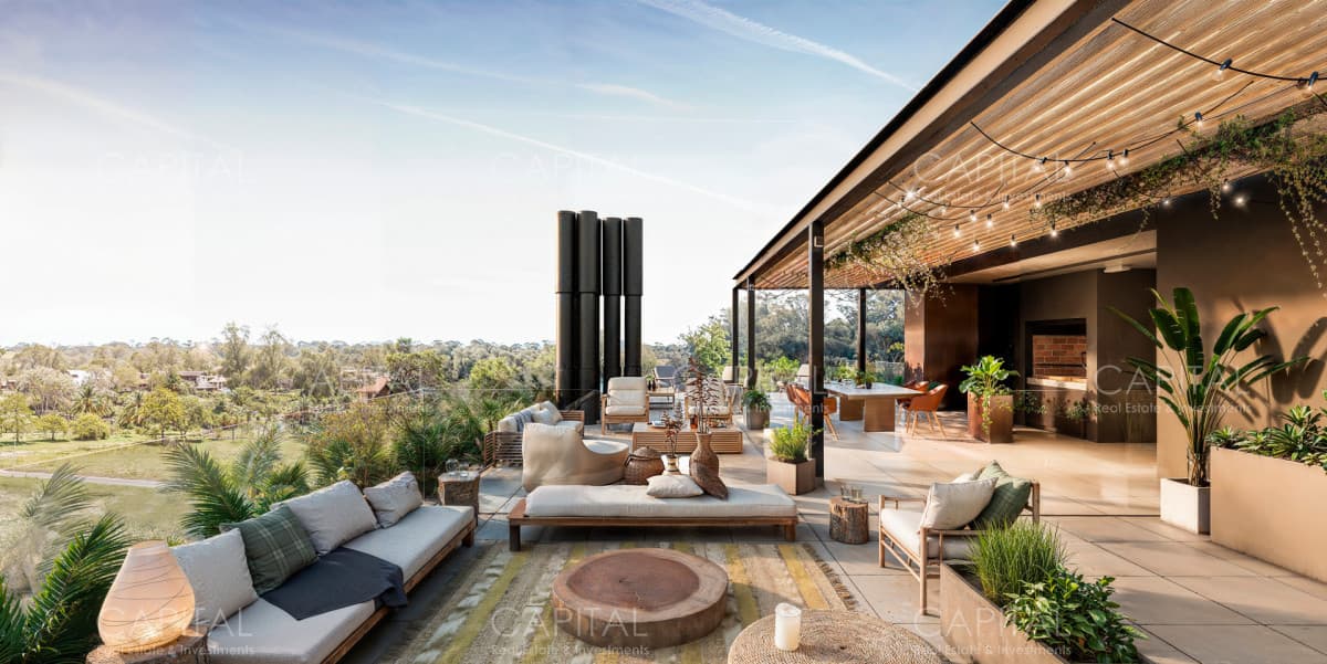 Apartamento tres dormitorios en venta con jardín exclusivo y 2 cocheras