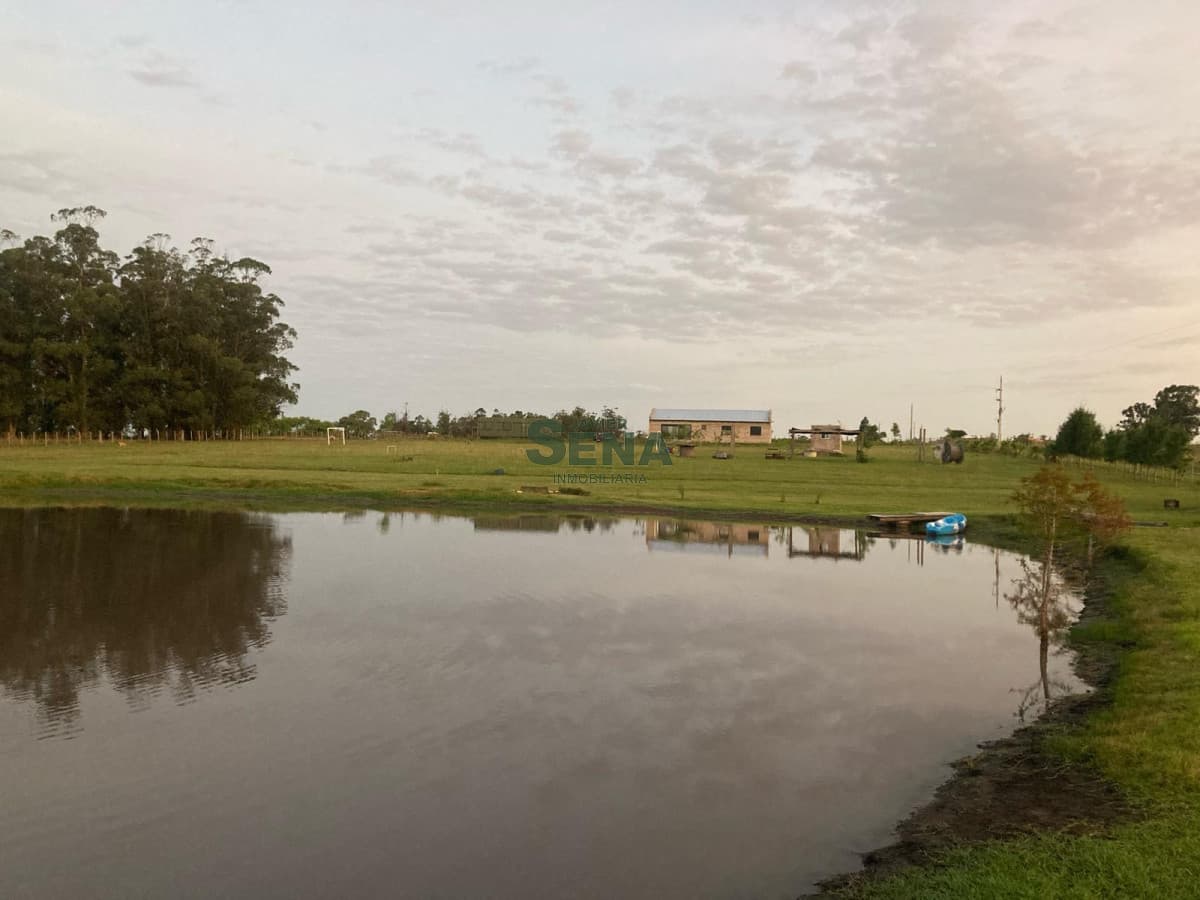 Venta de chacra san carlos, con casa para vivir cerca de la ciudad.