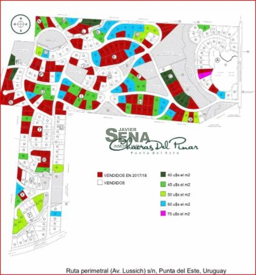 Venta de lote en barrio privado Punta Ballena, 2000m2 de tierra con servicios.