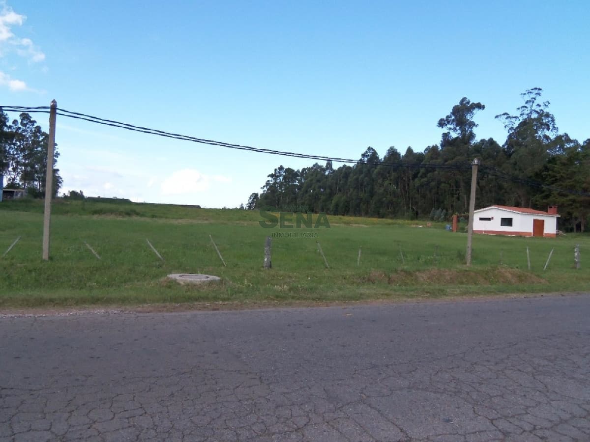 Venta de tierra en Lussich, fraccionamiento de 28850m2