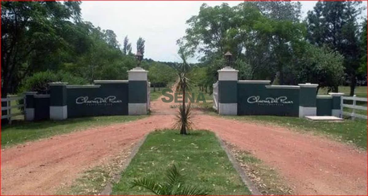 Venta de lote en barrio privado Punta Ballena, 2000m2 de tierra con servicios.